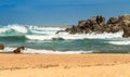 Beach with Waves and Rocks