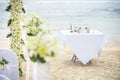 Beach wedding set up on beach.