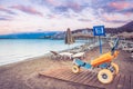 Beach wheel chair for disabled swimmers. Royalty Free Stock Photo