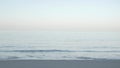 The beach with white sand and calm wave