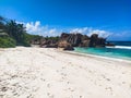 Beach with white sand and rocks at La Digue island, Seychelles Royalty Free Stock Photo