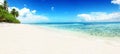 Beach with white sand, sun and quiet ocean. Tropical banner Royalty Free Stock Photo