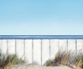 Beach and White Wooden Fence Royalty Free Stock Photo