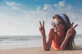 Beach woman funky happy and colorful wearing sunglasses having summer fun during travel holidays vacation. Young trendy Royalty Free Stock Photo