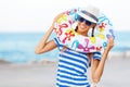 Beach woman happy and colorful wearing sunglasses and beach hat having summer fun during travel holidays vacation Royalty Free Stock Photo