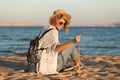 Beach woman happy and wearing sunglasses and beach hat having summer fun during travel holidays vacation Royalty Free Stock Photo