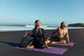 Beach. Woman And Man Workout In Morning. Sport Couple In Fashion Sportswear Doing Stretching Exercise For Flexibility. Royalty Free Stock Photo