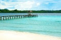 Beach and wooden dock on Bolilanga Island Royalty Free Stock Photo