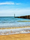 Beach with wooden weave breakers Royalty Free Stock Photo