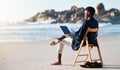 Beach, work and black man reading an email on a laptop with 5g internet while working by ocean. Relax, smile and happy Royalty Free Stock Photo