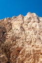 Beach of the Wreck, Zakynthos. White and beige colored rocks overlooking the splendid sand of the most famous Greek beach.