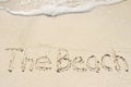 The Beach Written in Sand on Beach