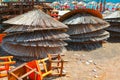 Beach yard with exotic umbrellas Royalty Free Stock Photo