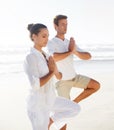 Beach yoga, balance and relax couple meditate for spiritual peace, self care and outdoor wellness for chakra healing