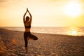 Beach yoga session by polish sea