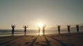 Beach Yoga at Sunset: A Group Practice Royalty Free Stock Photo
