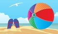 Beachball and flipflops at the beach Royalty Free Stock Photo