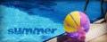 Beachball and swimmingpool. Royalty Free Stock Photo