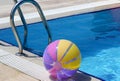 Beachball and swimmingpool. Summer vacations Royalty Free Stock Photo