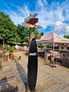 Beachbar Bielefeld am Obersee - Surfboard with signposts Royalty Free Stock Photo