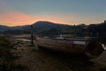 Beached boat in a sunset Royalty Free Stock Photo