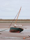 Beached sail boat at low tide Royalty Free Stock Photo