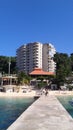 Beachfront condo with blue sky Royalty Free Stock Photo