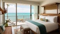 A beachfront hotel room with a balcony