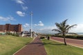 Beachfront Promenade against Blue Coudy Cityscape in Durban Royalty Free Stock Photo