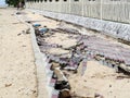 Beachfront road boardwalk damaged by storm surge