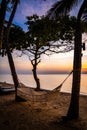 Beachfront sunrise with pool and palm trees in Hua Hin, Prachuap Khiri Khan, Thailand Royalty Free Stock Photo