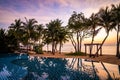 Beachfront sunrise with pool and palm trees in Hua Hin, Prachuap Khiri Khan, Thailand Royalty Free Stock Photo