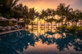 Beachfront sunrise with pool and palm trees in Hua Hin, Prachuap Khiri Khan, Thailand Royalty Free Stock Photo