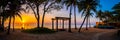 Beachfront sunrise with pool and palm trees in Hua Hin, Prachuap Khiri Khan, Thailand Royalty Free Stock Photo