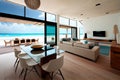 beachfront villa with open floor plan, modern furnishings and sleek design elements Royalty Free Stock Photo