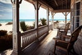 beachfront villa with wrap-around porch and rocking chairs Royalty Free Stock Photo