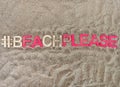 #beachplease beach please written on sand at the beach