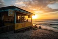 beachside eatery, with sun setting over the ocean, and waves rolling in