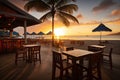 beachside eatery with view of sunset, showcasing a tranquil and peaceful scene
