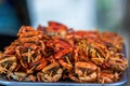 Beachside street food, fried small crabs and fried sea fish Royalty Free Stock Photo
