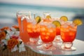 A beachside wedding reception with elegant glasses of rum punch Royalty Free Stock Photo