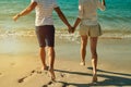 Beachy days are barefoot days. a carefree young couple running along the beach.