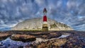 Looking up to Beachy Head light and cliff - a stitched panorama taken from below the light house at Beachy Head, East Sussex, UK Royalty Free Stock Photo