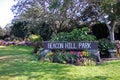 Beacon Hill Park sign, flowers and trees in Victoria