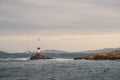 Beacon Navigation near stormy rocks