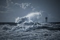 Beacon and pier under heavy storm