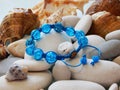 Bead blue bracelet and pebble