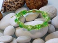 Bead green bracelet and pebble