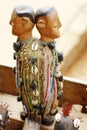 Beaded statuettes symbolizing union and dissolution