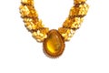 Beads with amber, brooch, bright colorful pieces of amber